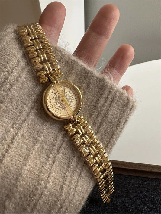 Bold Gold Women’s Watch with Engraved Dial